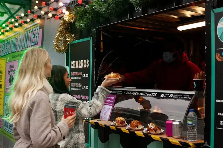 Food truck serving customers from a compact service window